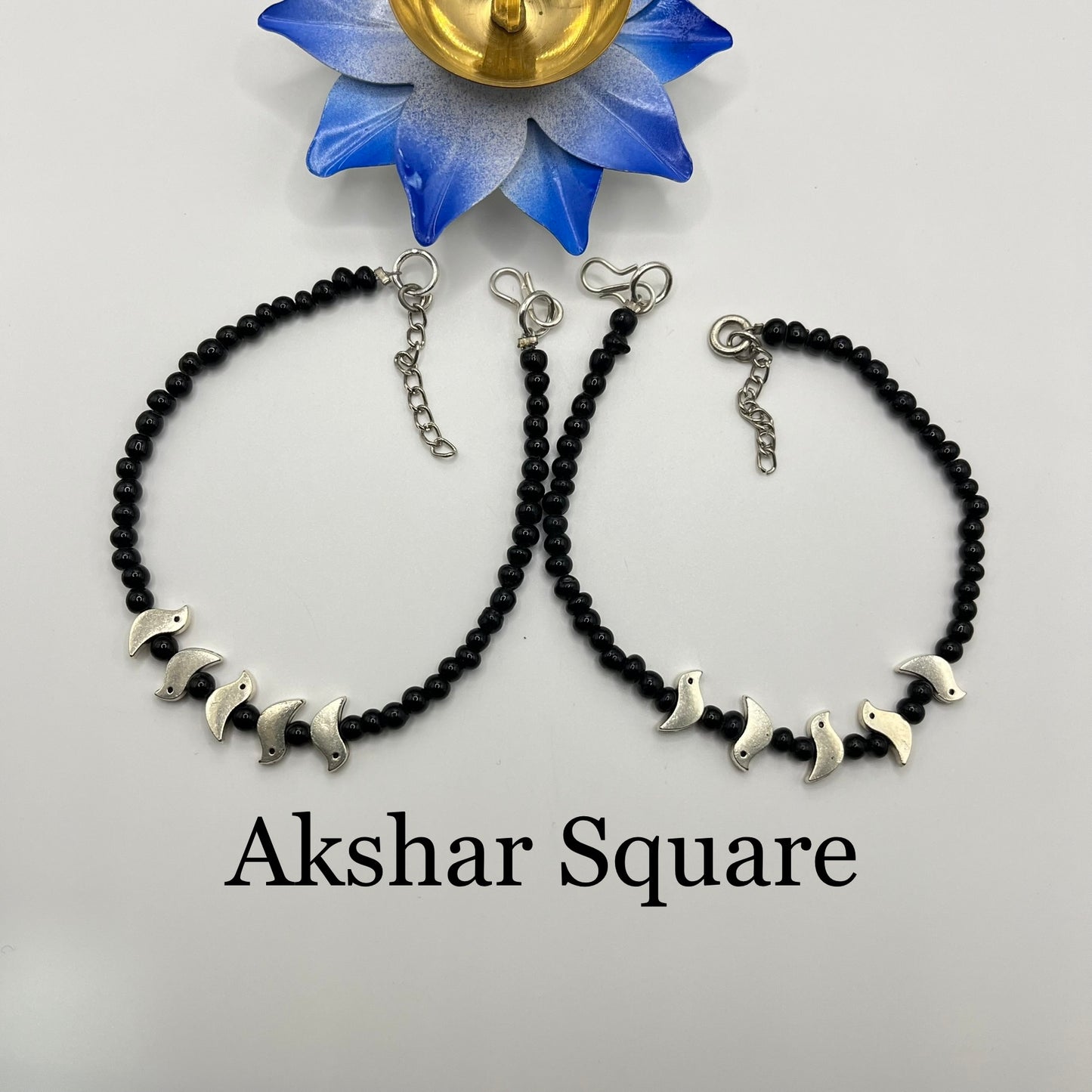 Black bead bird anklets