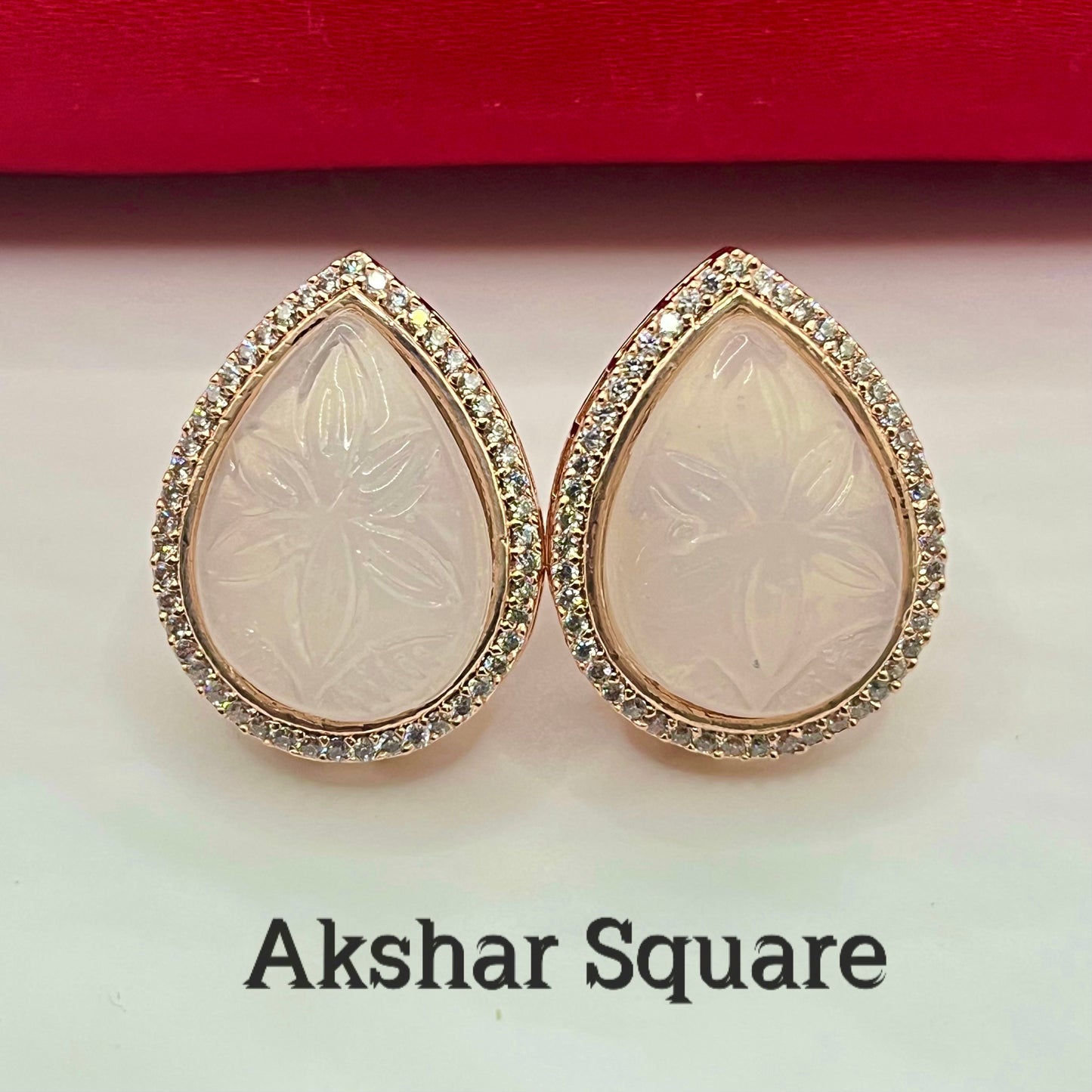 Rosegold carved stone stud earrings