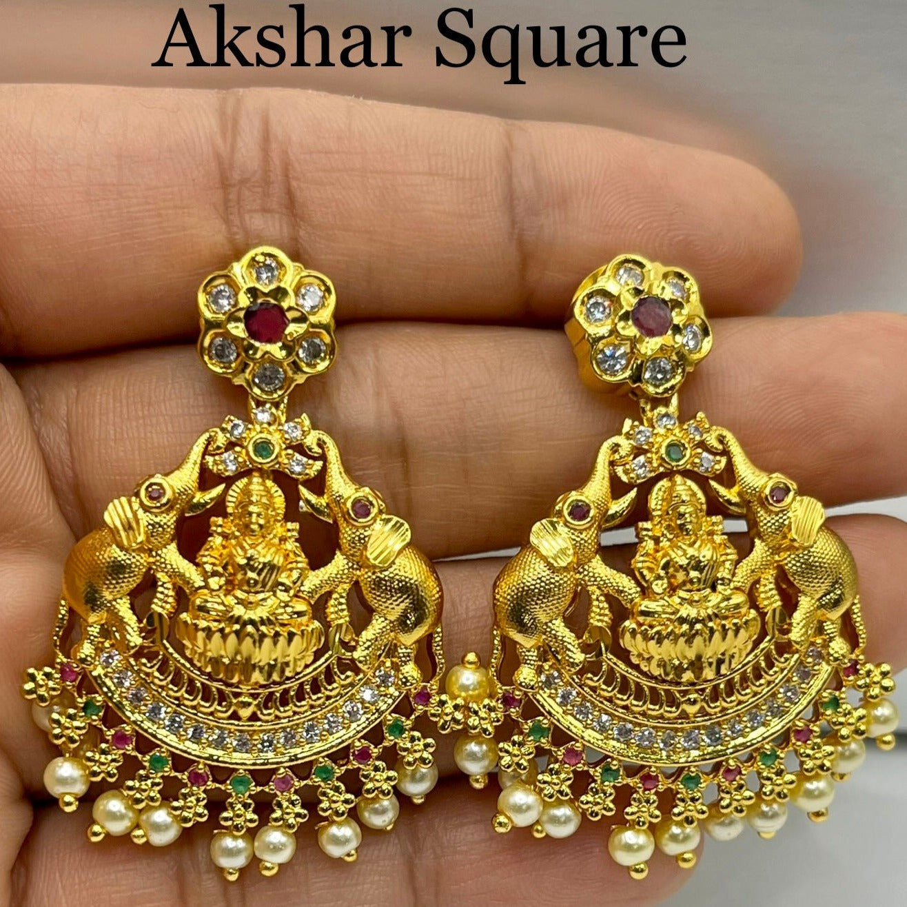 Gold finish temple pendant set