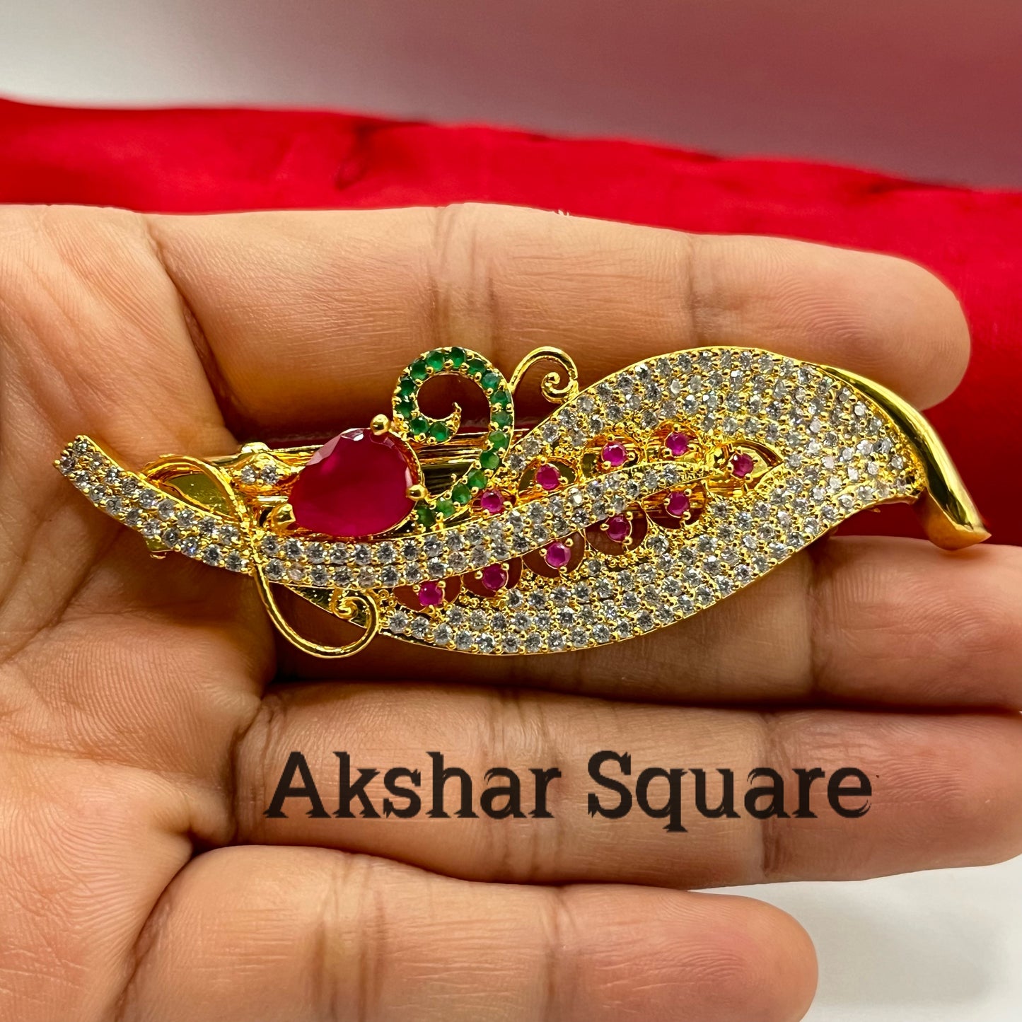 Gold finish feather shape hair clip