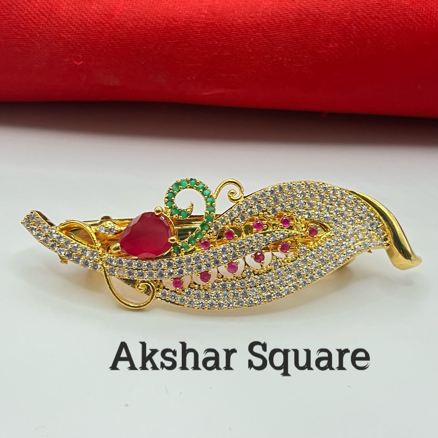 Gold finish feather shape hair clip