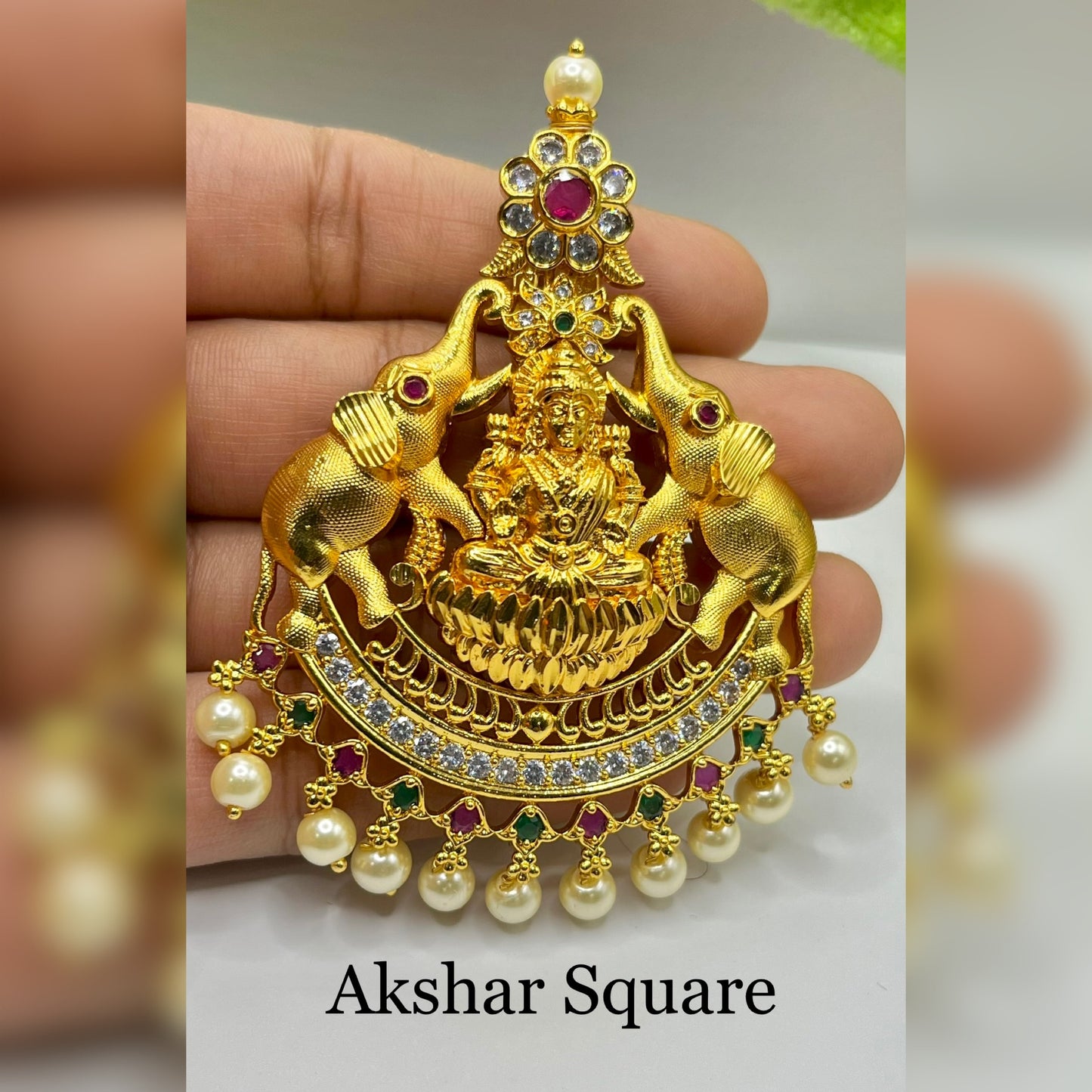 Gold finish temple pendant set
