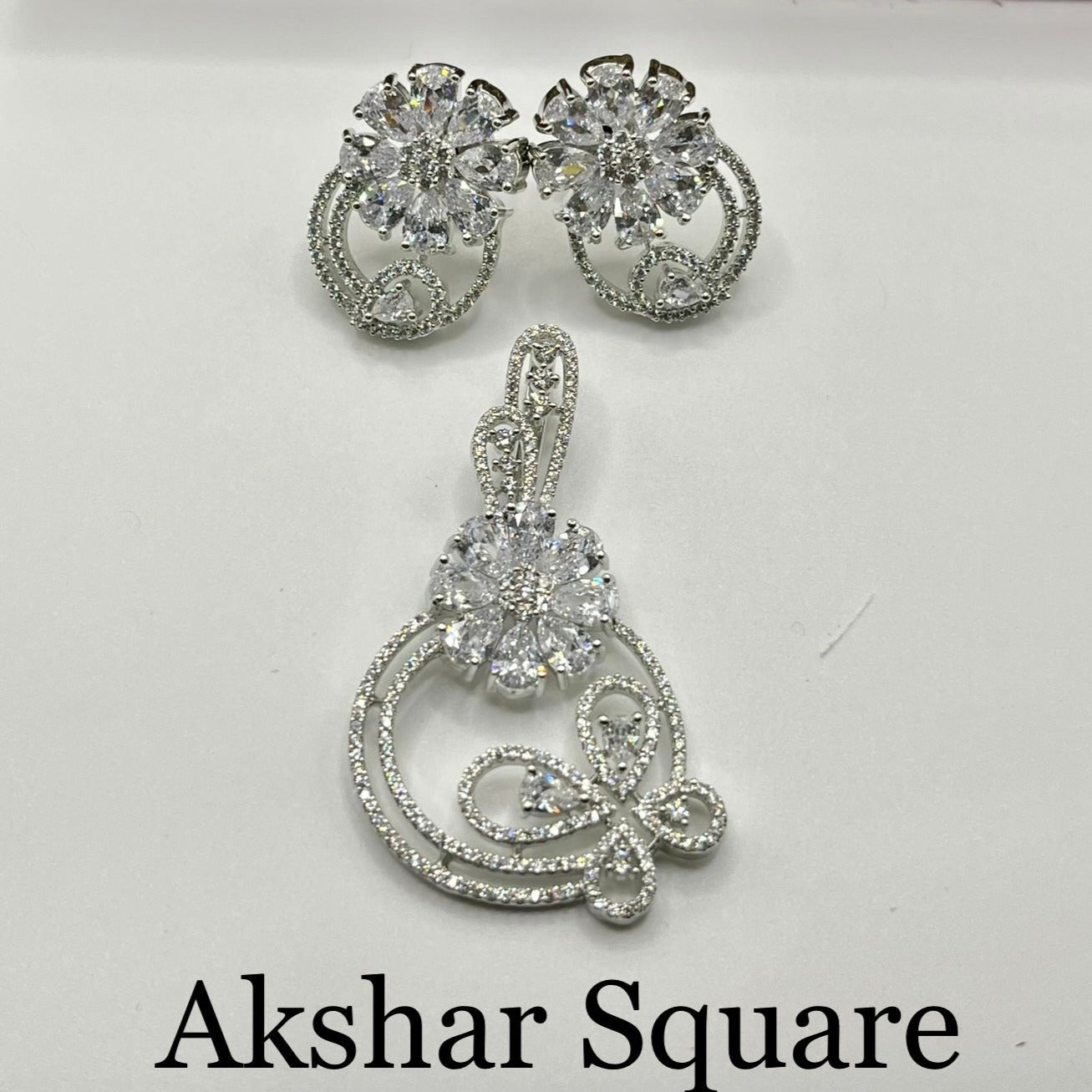 Rhodium finish pendant set
