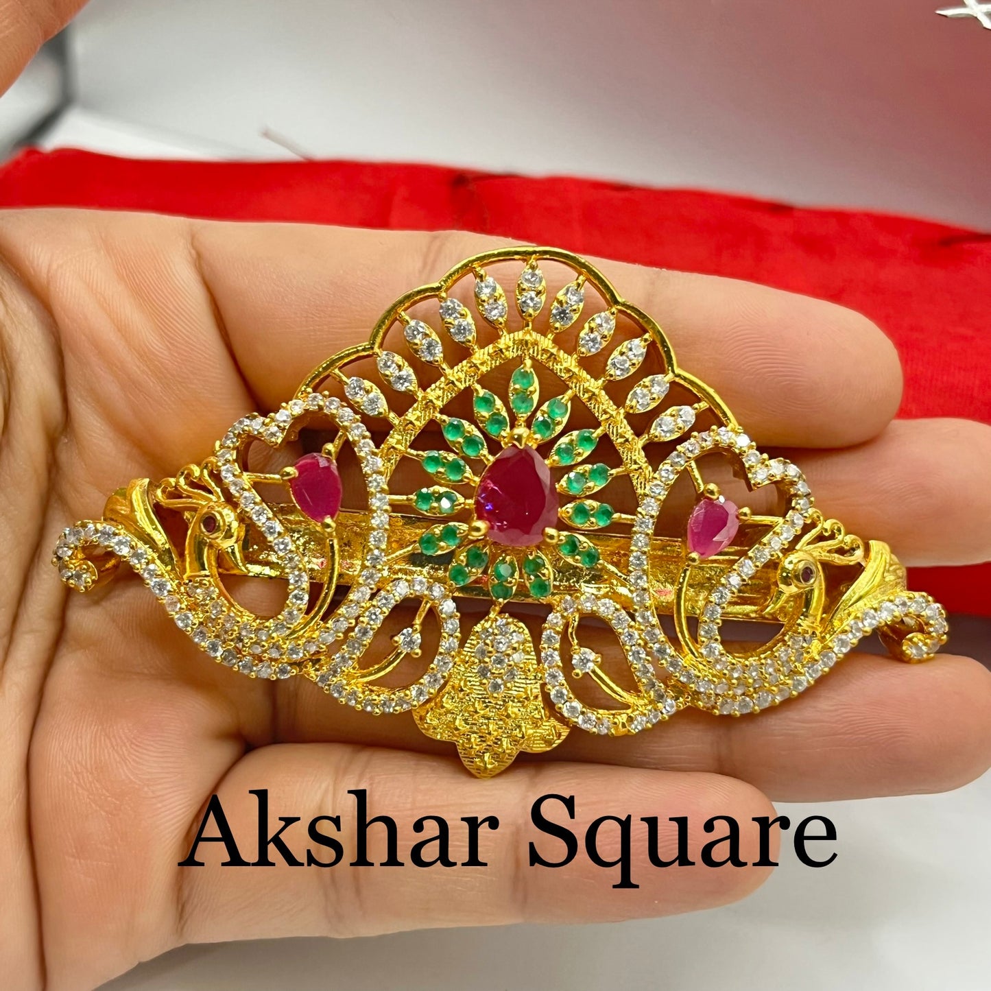 Gold finish peacock hair clip