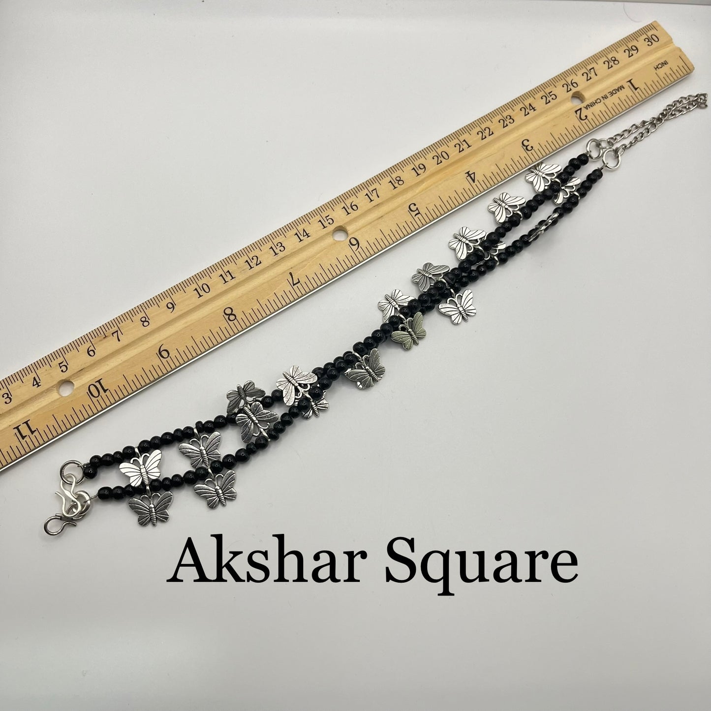 Black bead butterfly anklets