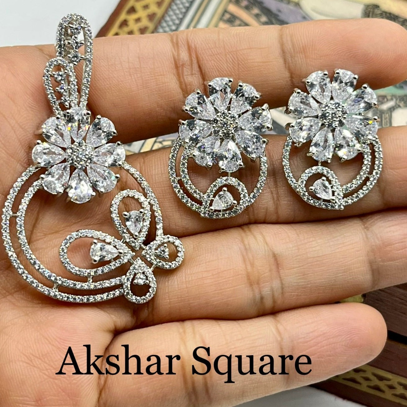Rhodium finish pendant set