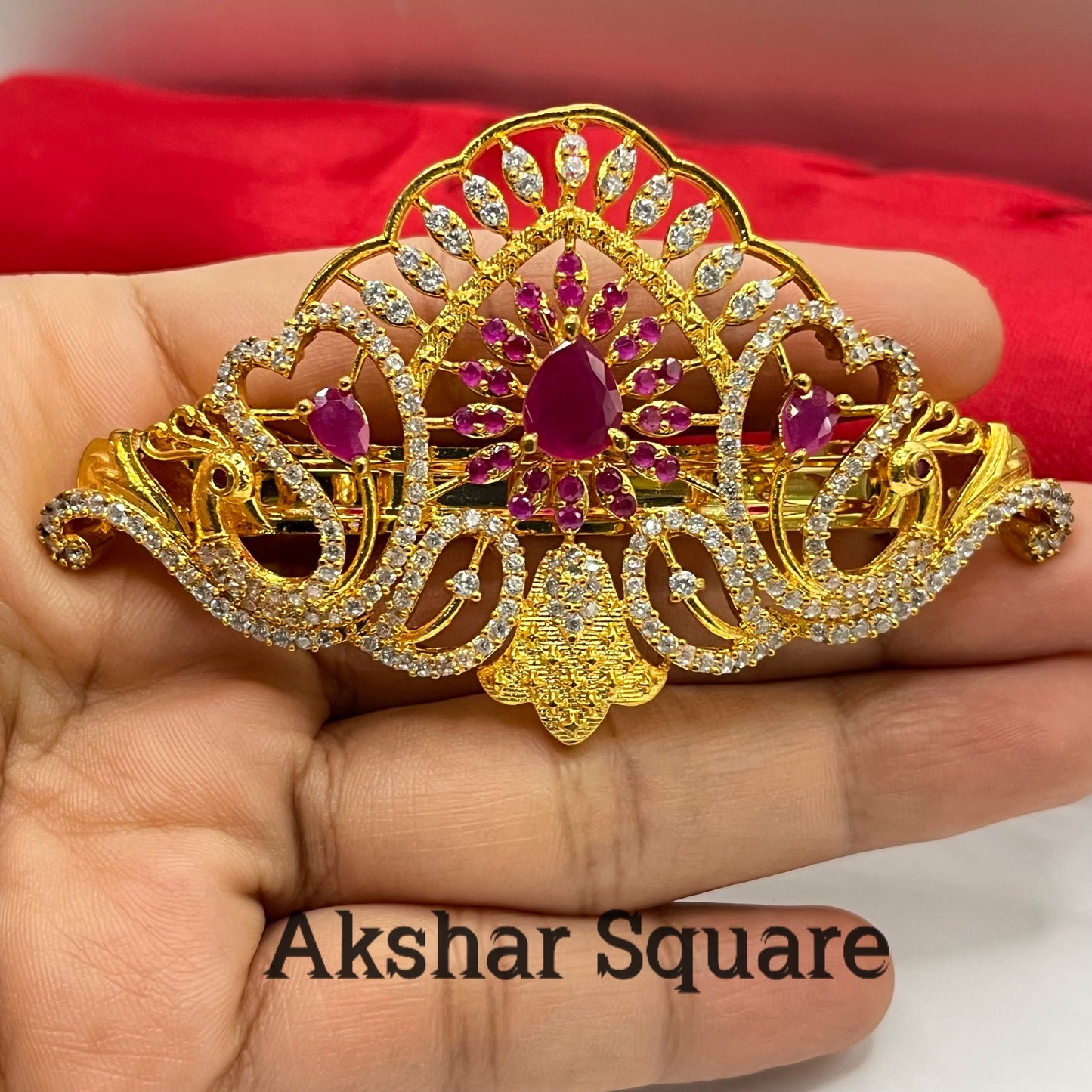 Gold finish peacock hair clip