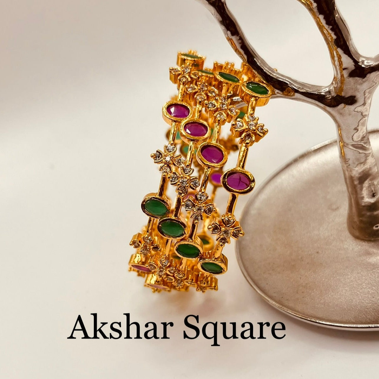 AD Bangles in gold finish
