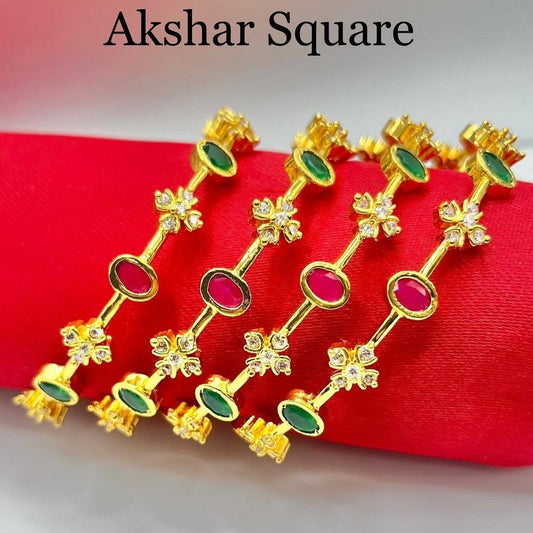 AD Bangles in gold finish