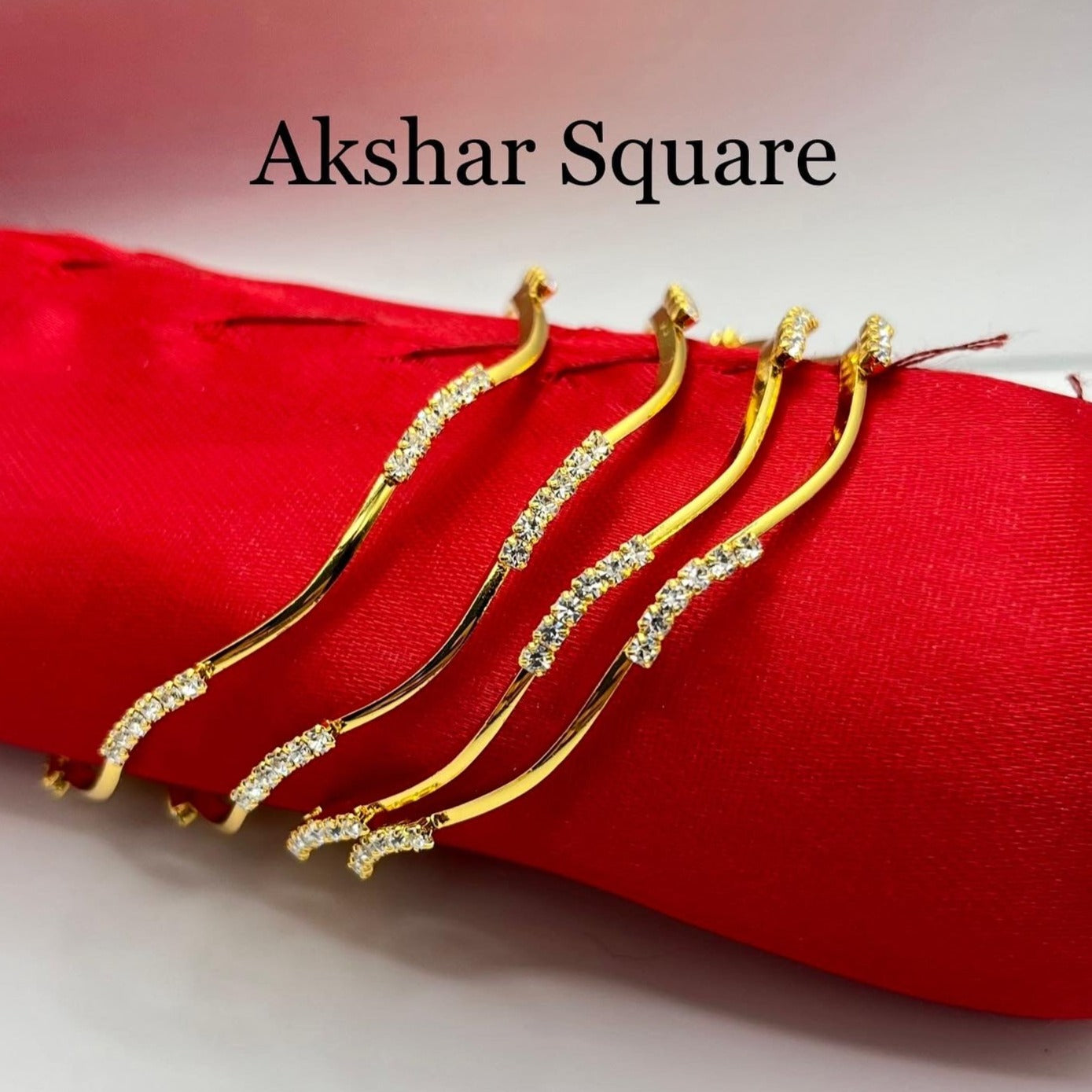 AD gold Bangles