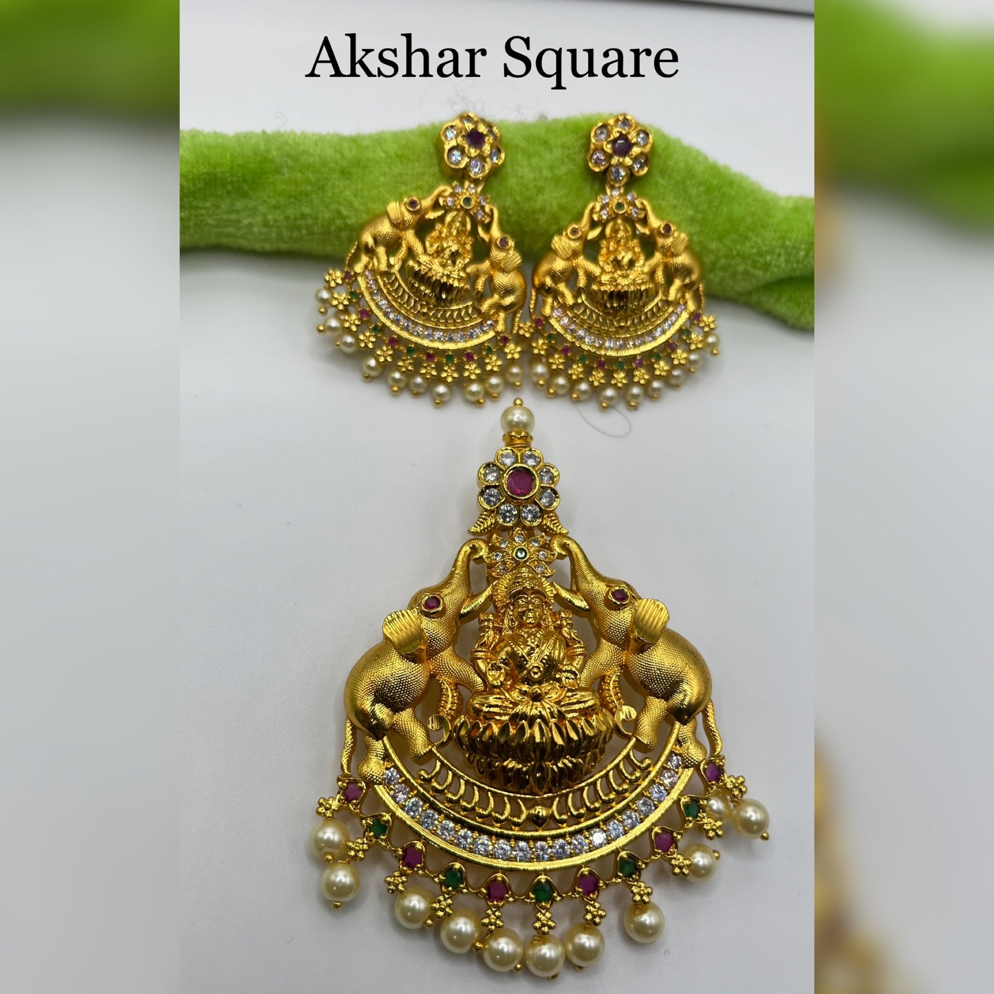 Gold finish temple pendant set