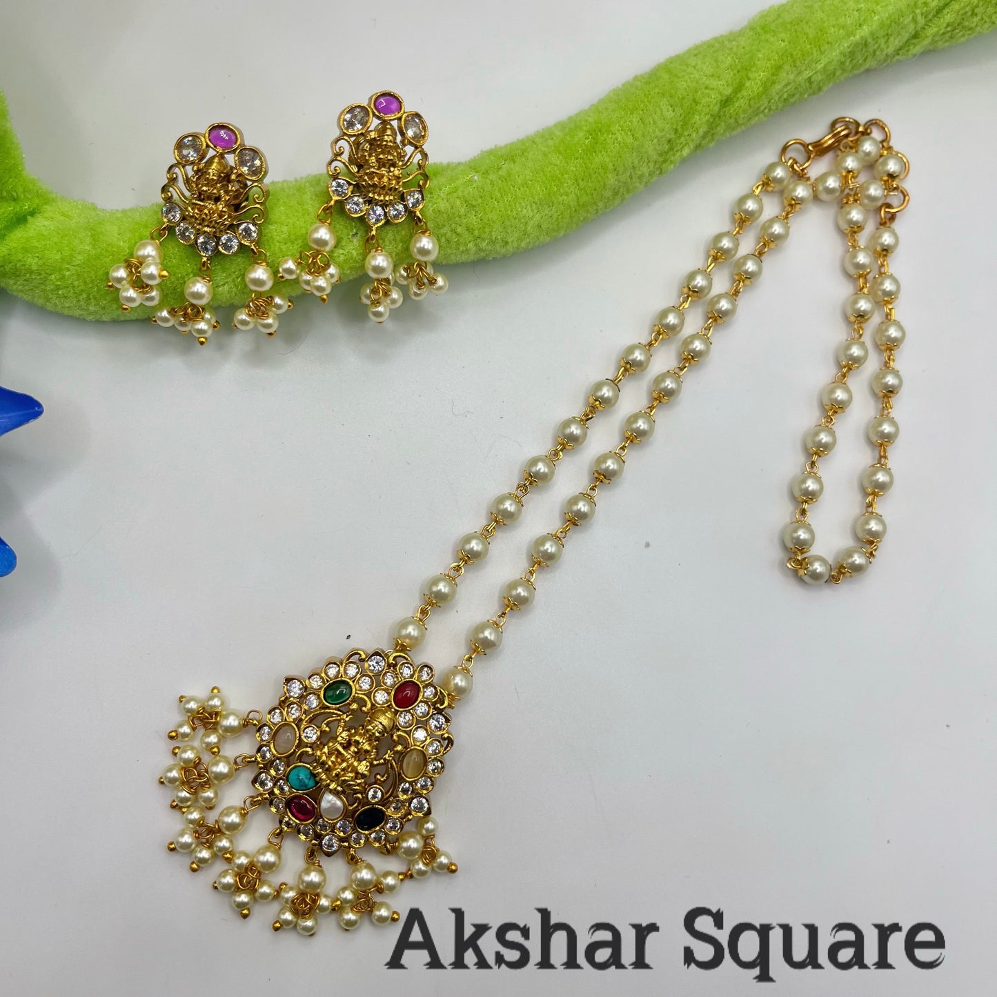 Pearl necklace set with Navratan Lakshmi Pendent