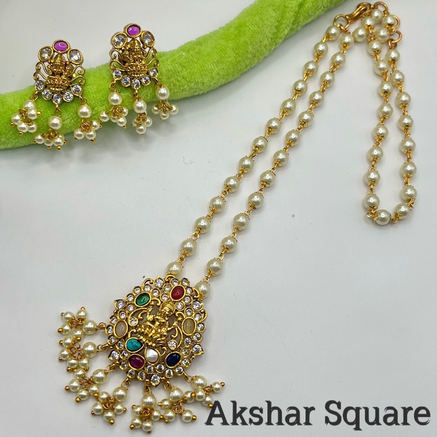 Pearl necklace set with Navratan Lakshmi Pendent