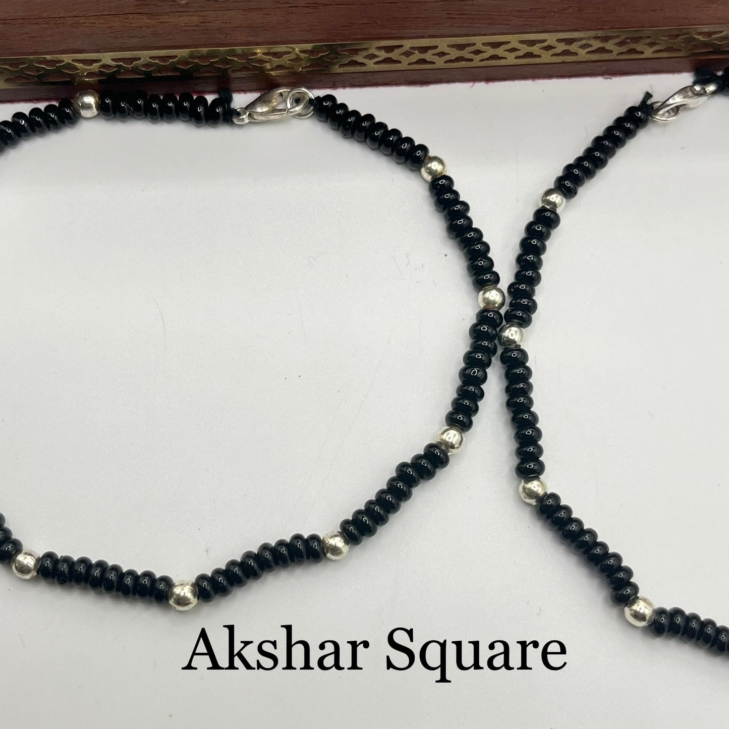 Black beads anklets
