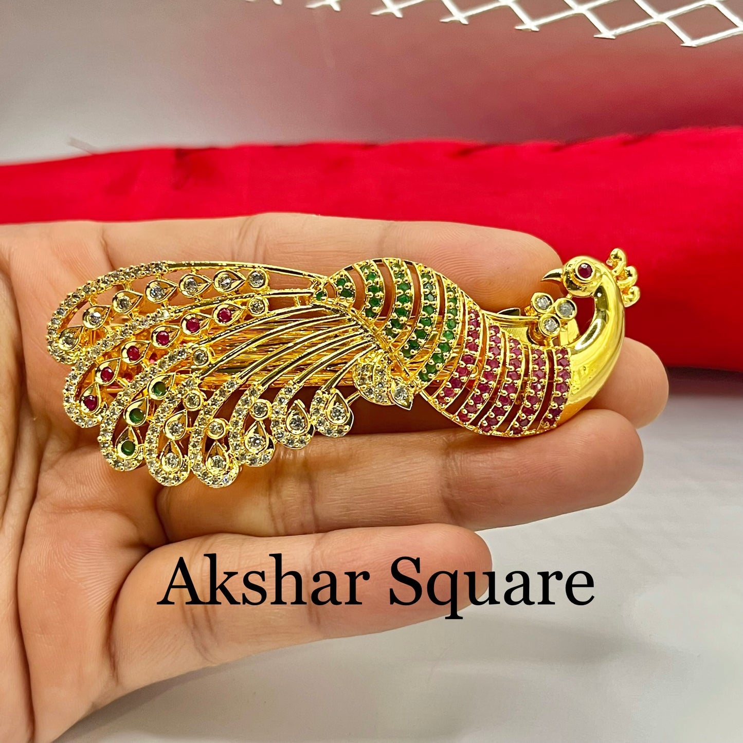 Gold finish peacock hair clip