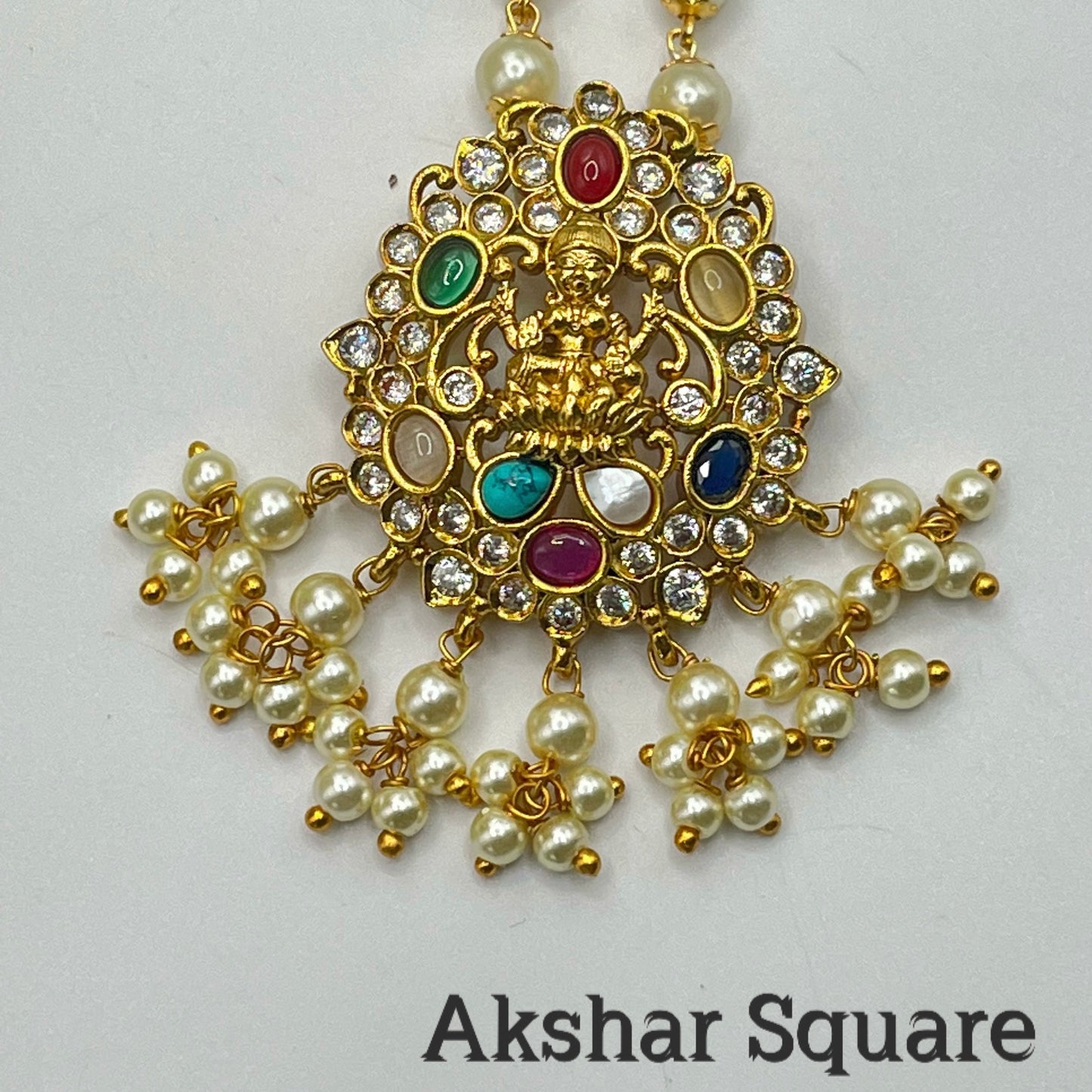 Pearl necklace set with Navratan Lakshmi Pendent